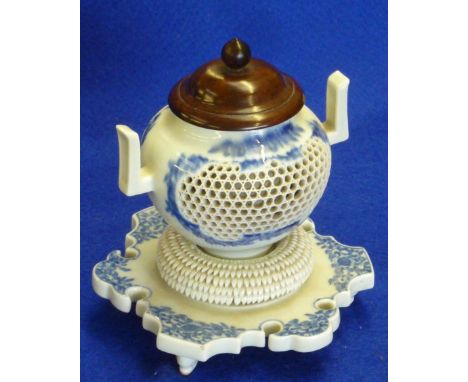 A two handled porcelain Oriental Vase with turned wooden cover (probably Japanese), sited on an elaborate tripod base with Ru