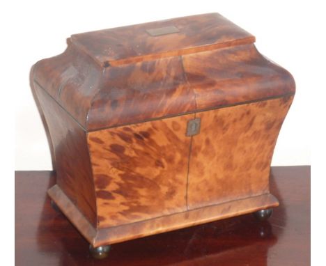 A late Regency period/early Victorian blond tortoiseshell veneered two-division Tea Caddy, the rectangular 'raised' upper sec