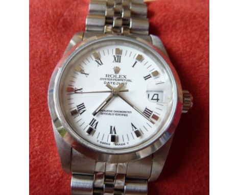A fine mid size Rolex stainless steel Oyster Perpetual Datejust superlative chronometer Wristwatch, the white dial (fully sig