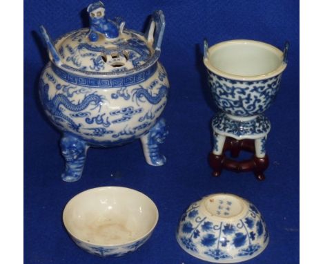 A Chinese porcelain two handled tripod Censer and Cover, the finial as a Karashishi with brocade ball, together with one furt