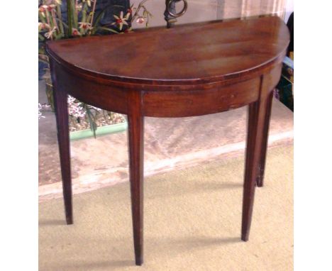 A George III period bow fronted mahogany Card Table on square tapering moulded legs, 83.5cm wide 