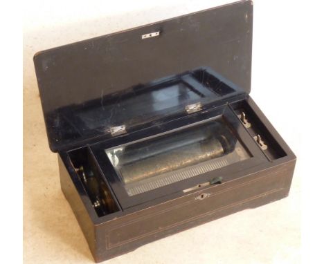 A late 19th Century Music Box the hinged lid with allegorical decoration of music and the arts, the Music Box with chains of 