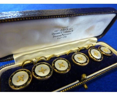 A cased set of six 9 carat and enamel Buttons (some damage) 