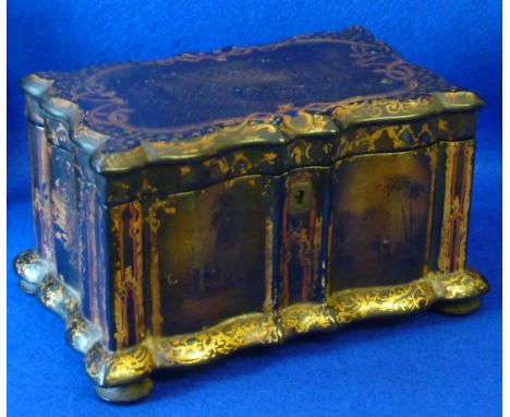 A mid 19th Century two division papier mache Tea Caddy, the lids and inverted serpentine sides with gilt decoration and vigne