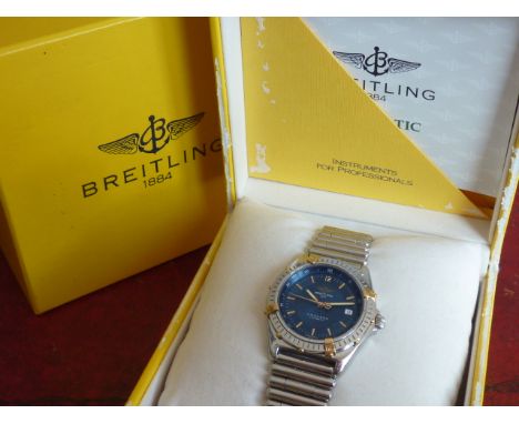 A gentleman's boxed Breitling Antares Automatic Wristwatch, blue dial (signed) with mostly baton markers and the date apertur