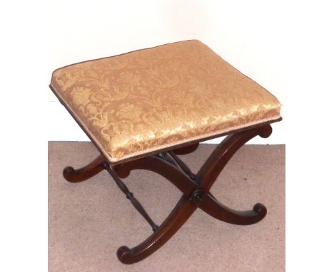 A Regency period mahogany cross frame Stool having a later upholstered damask style top (damage)