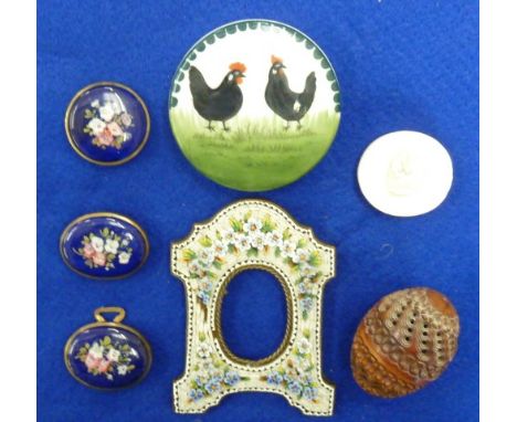 A mixed group including Grand Tour style Intaglio, carved Coquilla nut, floral encrusted early 20th Century Photograph Frame,