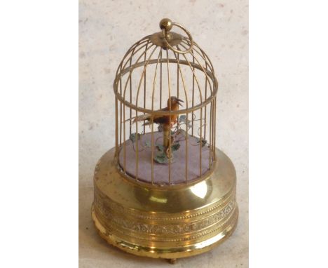 A circa 1900 German singing bird Automaton in gilt brass cage, good working order 