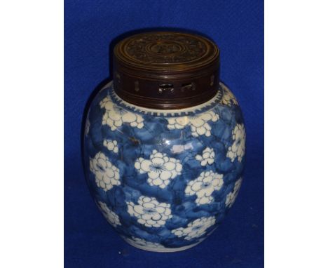 A Chinese ovoid porcelain Jar hand decorated with prunus against a cracked ice background in Kangxi style, together with pier