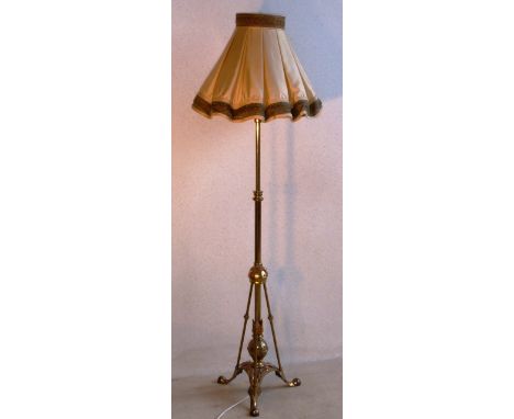 An early 20th Century brass and copper Lamp Standard in Arts and Crafts style, together with pleated silk Shade 