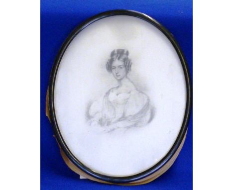 A mid 19th Century ebonised oval framed and glazed half length Portrait Sketch of a beautiful young lady, her hair tied up an