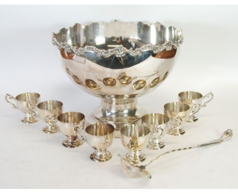 A POST-WAR ELECTROPLATED PUNCH BOWL WITH EIGHT CUPS AND LADLE