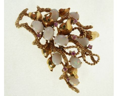 1970's MODERNIST OPAL AND GEM SET GOLD BROOCH, in the form of textured leaves and branches, claw set with nine oval opals, 8m