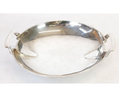 ART DECO SILVER TWO HANDLED CIRCULAR DISH, by THOMAS BRADBURY & SONS LTD, with angular handles over canted rims, 12 ½" (31.7c