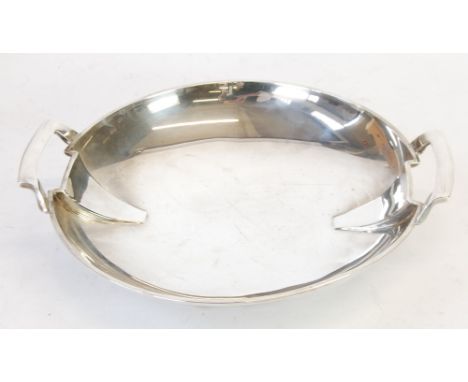 ART DECO SILVER TWO HANDLED CIRCULAR DISH, by THOMAS BRADBURY & SONS LTD, with angular handles over canted rims, 12 ½" (31.7c