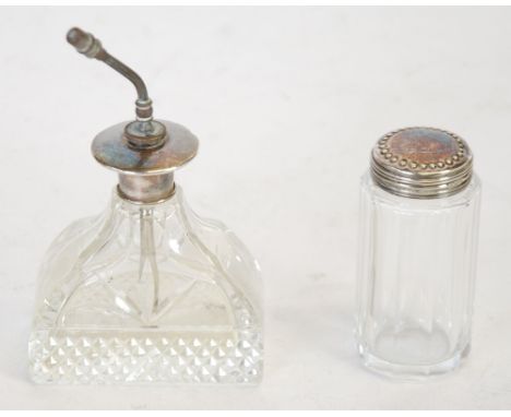 PANELLED GLASS TOILET JAR with silver screw off punch beaded lid and a CUT GLASS PERFUME ATOMISER, with screw off pump action