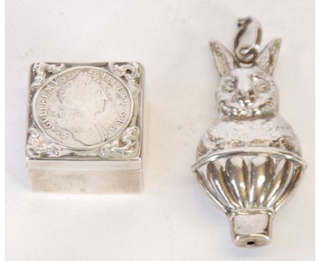 CHILD'S SILVER RABBIT RATTLE, Birmingham 1962, AND A SMALL SILVER TRINKET BOX, WITH WILLIAM III SHILLING INSET COVER, London 