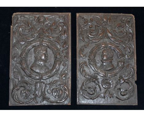 A pair of Early 19th Century Renaissance Revival carved oak panels, each centre with profile portrait of a Gentleman within s