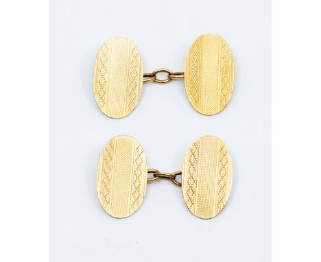 A pair of 9ct gold oval link cufflinks with engine turned decoration, weight approx 3gms Condition report: good- minor wear m