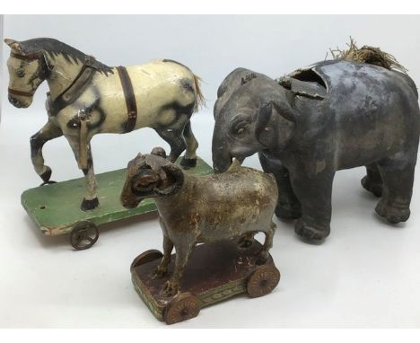 Vintage wooden and ceramic toys: outstanding collection of toys to include a wheeled elephant with nodding head (as found), a