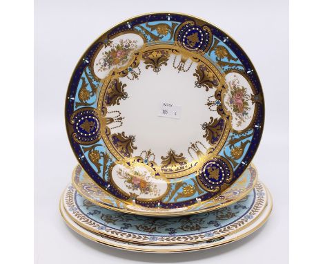A pair of 20th Century De Lamerie of England bowls, heavily gilt decoration, with light and dark blue infills, rose decoratio