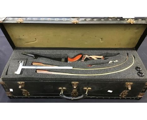 A cased archery bow with all accessories including arrows etc, complete