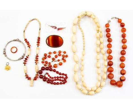 A collection of jewelery to include a banged agate brooch, agate bead necklaces, drop earrings, ring along with plastic bead 