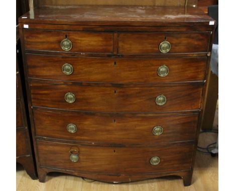 An early Victorian mahogany bow fronted chest of drawers, circa 1840, fitted with two short over four long graduated drawers,