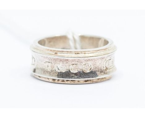 Tiffany & Co -A a silver Tiffany & Co  ring, with the signature NY T&Co 1837 stamp, width approx 8mm, sizeL1/2, weight approx