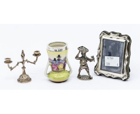 A group of silver miniatures to include: a George V silver mounted ceramic posy vase, body painted with women wearing Welsh h