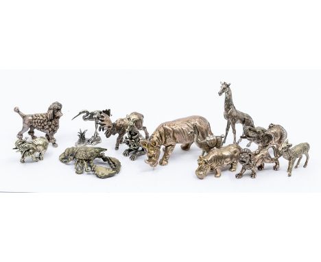 A sterling silver stamped 925 model of a Rhinosaurus together with a large group of 800 standard small model of animals to in