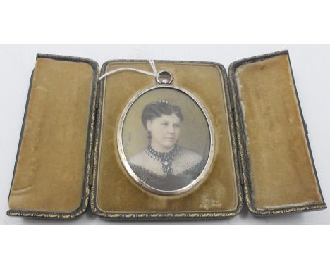 A late 19th/early 20th century oval portrait miniature of Dora Watson (nee White) age 23, signed G. Liang, pinxit, approx 7cm