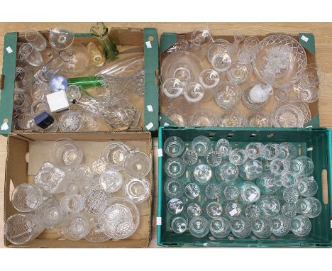 Four boxes of cut and crystal glass wares including glasses and vases, along with Caithness paperweights etc