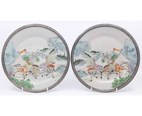 A pair of Chinese porcelain plates with silvered bellflower cast rims