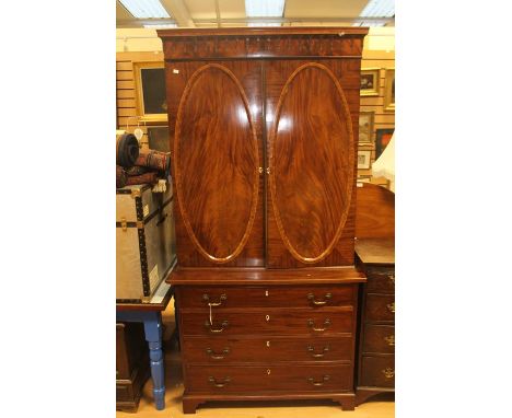 An early 19th Century mahogany Secretaire bookcase, circa 1830, the upper section with Gothic moulded pediment, two doors enc