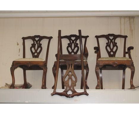 A set of six Chippendale style chairs, 20th Century, comprising two carved chairs and four side chairs, (one chair AF), each 
