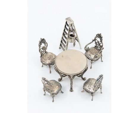 A group of miniature silver furniture to include: Four Russian .84 standard (1st Kokoshnik mark) chairs - 3 side chair, one a