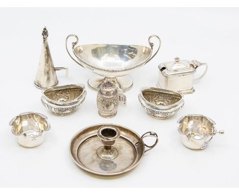 A collection of Victorian and early 20th Century table silver to include: A Neo-Classical boat shaped salt, London, 1902Pair 