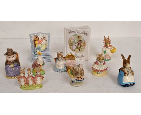 A collection of boxed Royal Albert Beatrix Potter figures, along with Royal Doulton Brambly Hedge tea service