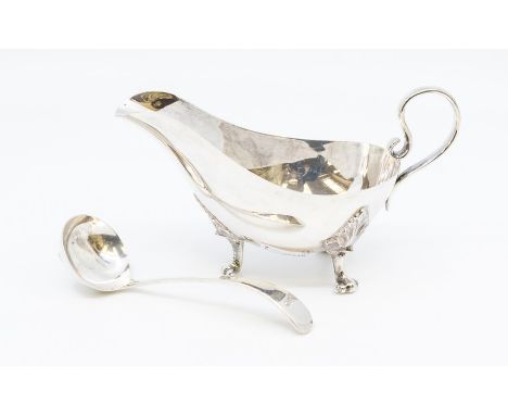 A George VI silver sauceboat, plain with acanthus and scroll feet, by James Dixon &amp; Sons, Sheffield, 1935, Jubliee marks 