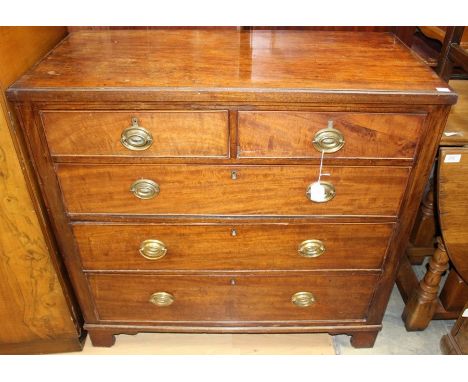A George III mahogany chest of drawers, comprising two short over three long graduated drawers, with cock-beaded edges, some 