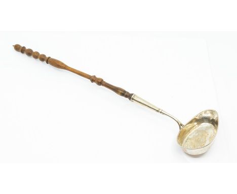 A 19th Century Swedish silver large plain oval ladle, with turned wooden handle, date letter M4 for 1842, maker' s mark B &am