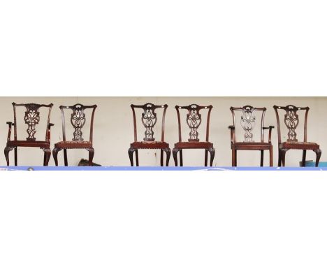 A harlequin set of six Georgian style dining chairs, in the manner of Thomas Chippendale, pierced back splats, comprising two