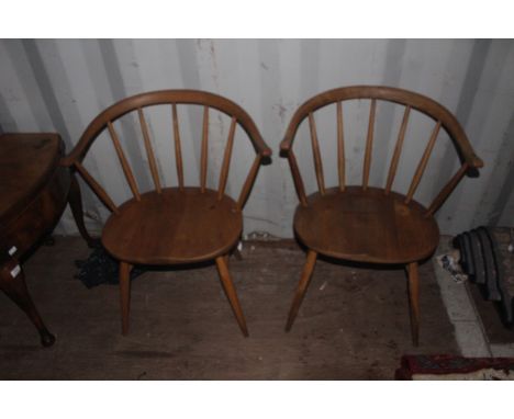 A pair of Ercol stick back chairs, 76cm high, 65cm wide, 42cm deep (2)