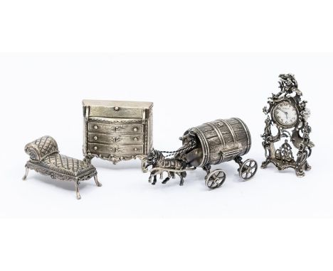 A collection of novelty silver to include: a German 800 standard model of a horse drawing a beer barrel (ring box); an ornate