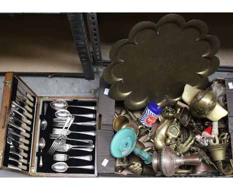 A collection of assorted metalware to include Indian brassware plates, brass figures including dolphin, elephant and other me