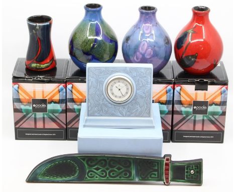 Four Poole Pottery vases in boxes, along with a Poole wall plaque of a machete and Wedgwood ceramic wall clock