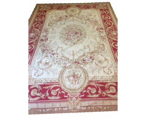 AUBOSSON 'SAVONERIE' DESIGN NEEDLEPOINT CARPET, 365cm x 265cm, floral swags and bouquets on a golden field within a rouge bor