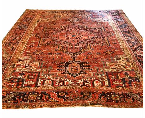 ANTIQUE PERSIAN HERIZ CARPET, 380cm x 285cm.