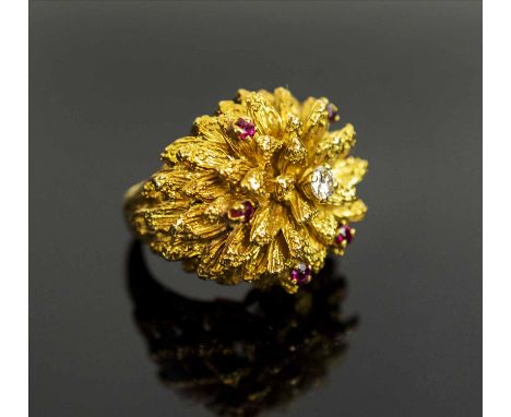 A 1950's RUBY AND DIAMOND SET DRESS RING, of flower design, finger size J, total weight 21.6 grams.